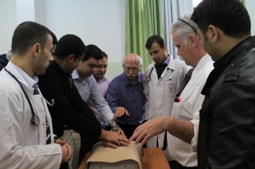 ACLS drill at Al Shifa with residents and Cardiologist Bob Haynes MD.jpg          2