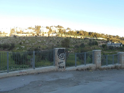 Fence built by Israel 5 years ago dividing ancient road from Wadi Joz to Al Aqsa Mosque.  Land to the East is now off limits to Palestinians.  Amro home is the first home immediately to the West at the intersection with the road that connects Hebrew University Mt . Scopus with Rockefeller museum/Herods gate in the Old City.