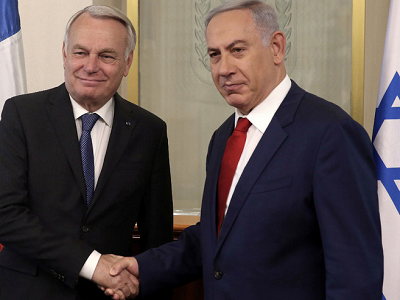 Benjamin Netanyahu  shakes hands with French Foreign Minister Jean-Marc Ayrault