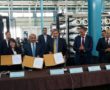 The signing ceremony of an agreement to support the second phase of the Gaza small scale desalination plant. (Photo: Johannes Hahn Twitter)