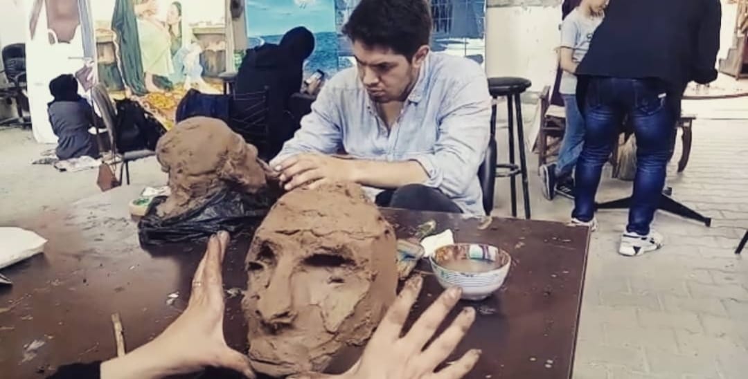 Walid while making a sclupture